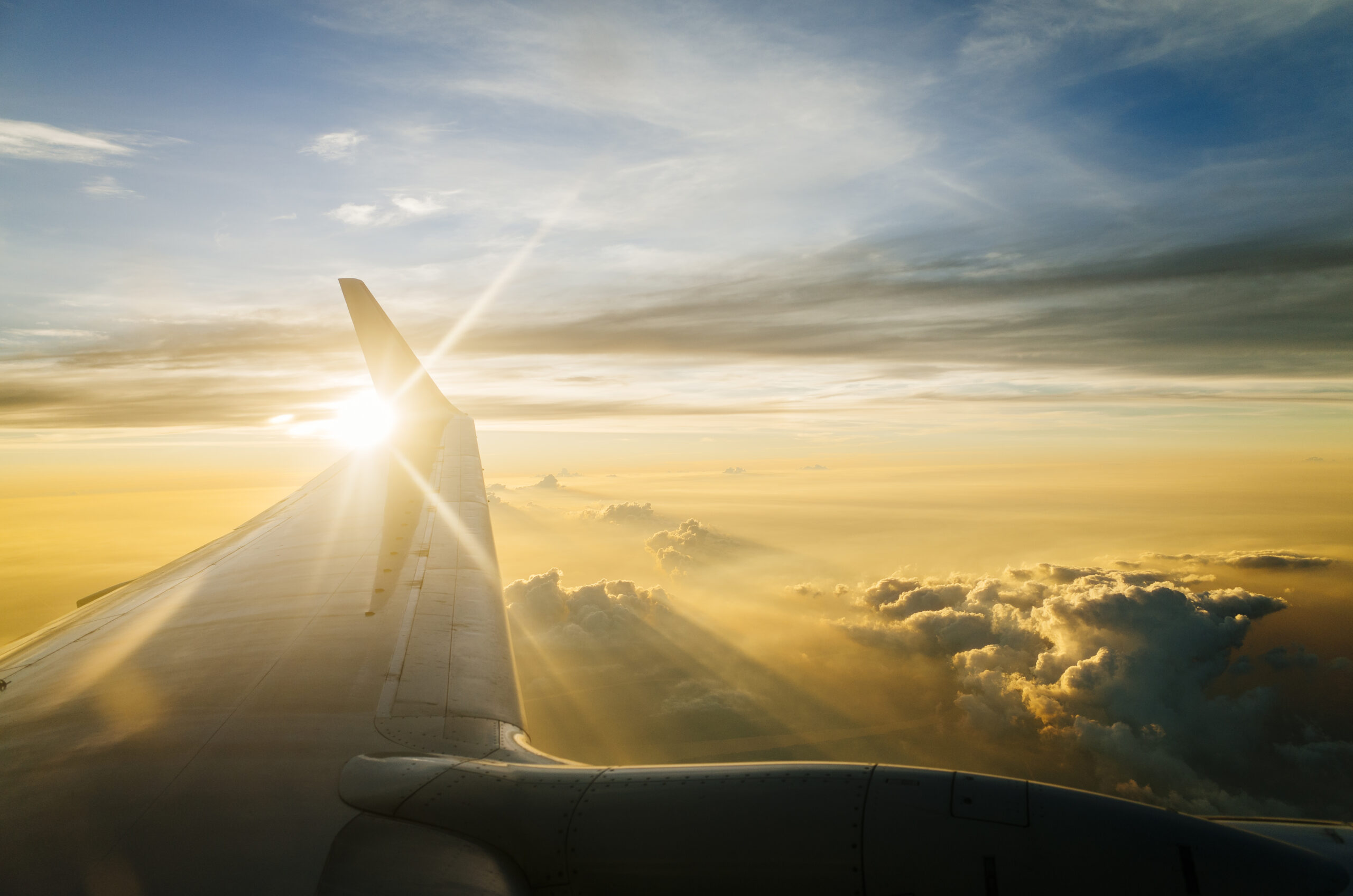 <a href="https://www.freepik.com/free-photo/wing-airplane-blue-sky-twilight-sunset_4690278.htm#fromView=search&page=1&position=46&uuid=c1834905-eb86-4c38-9e42-b67a0cd183e0">Image by jcomp on Freepik</a>